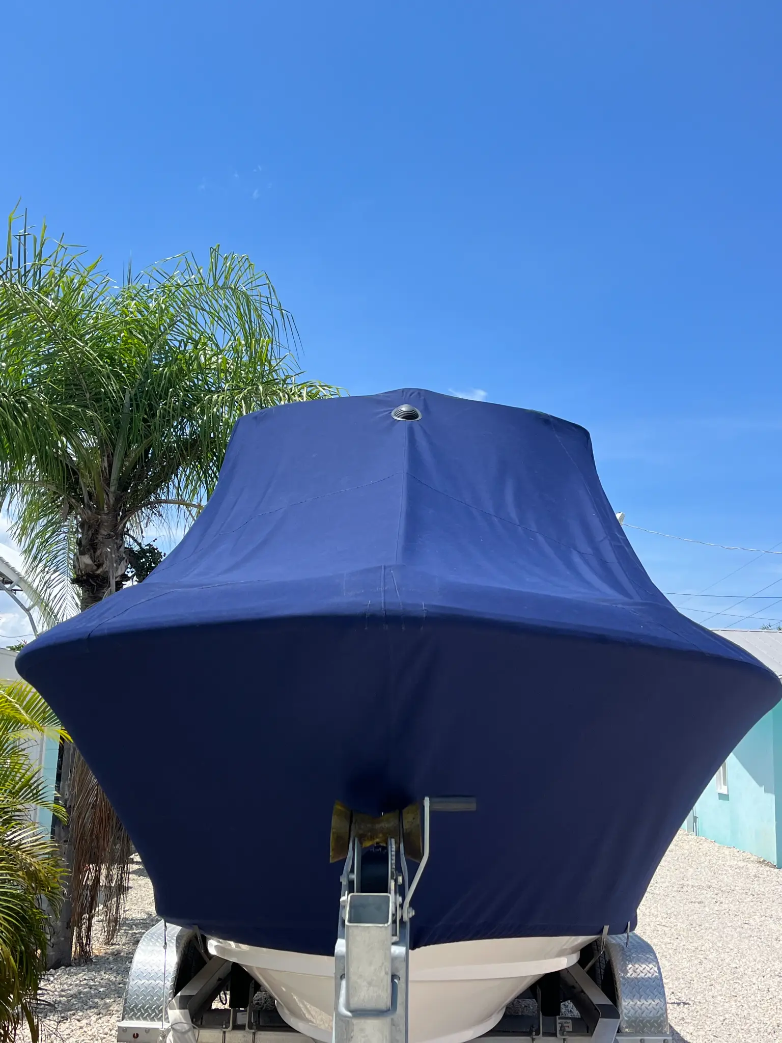 Navy blue boat cover with custom canvas
