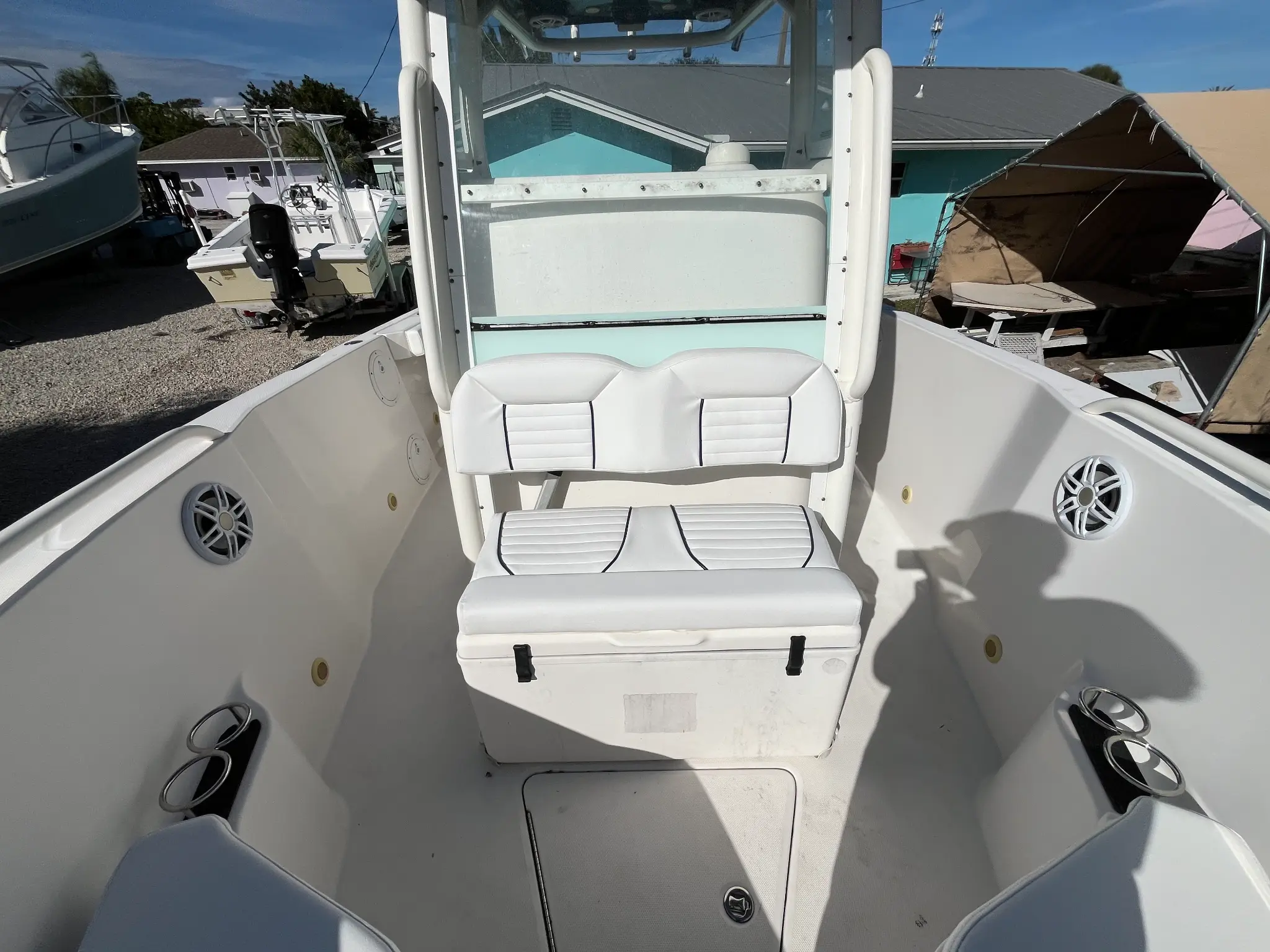 White boat interior with custom seating and t-top